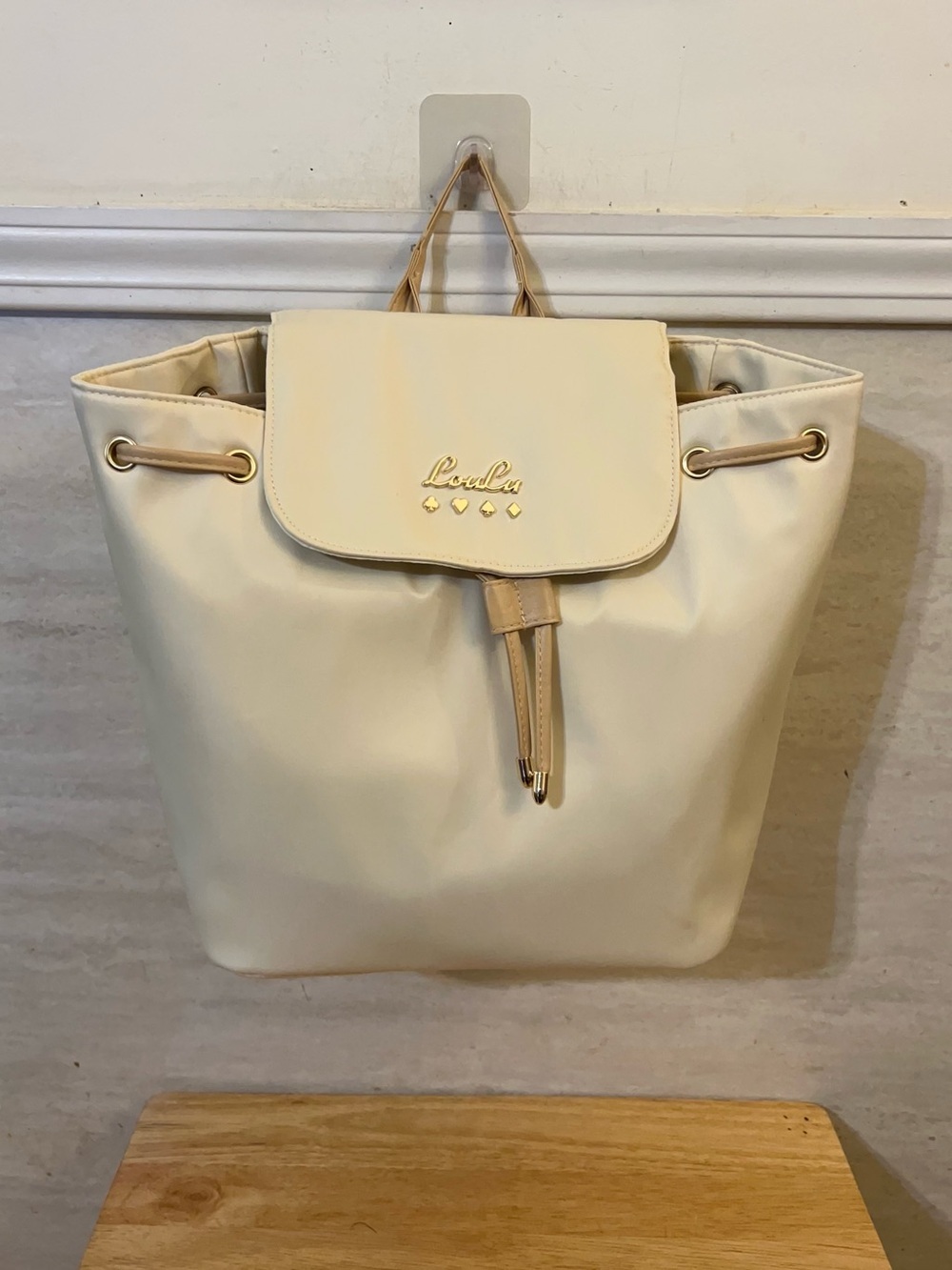 Loulu Faux-Leather Backpack Purse in an off-
..white/cream